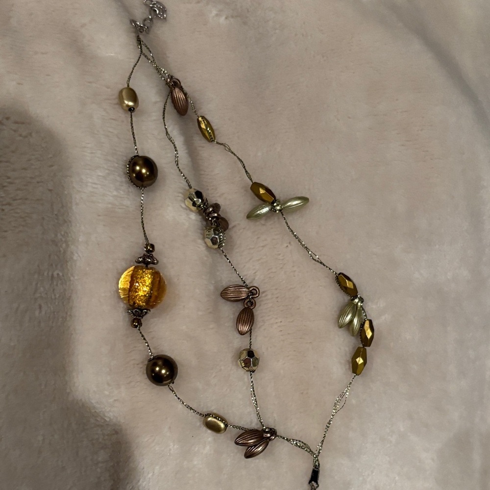 Elegant Gold and Brown Beaded floating bracelet